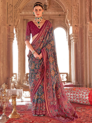 Captivating Navy Blue Patola Printed Georgette Saree With Blouse